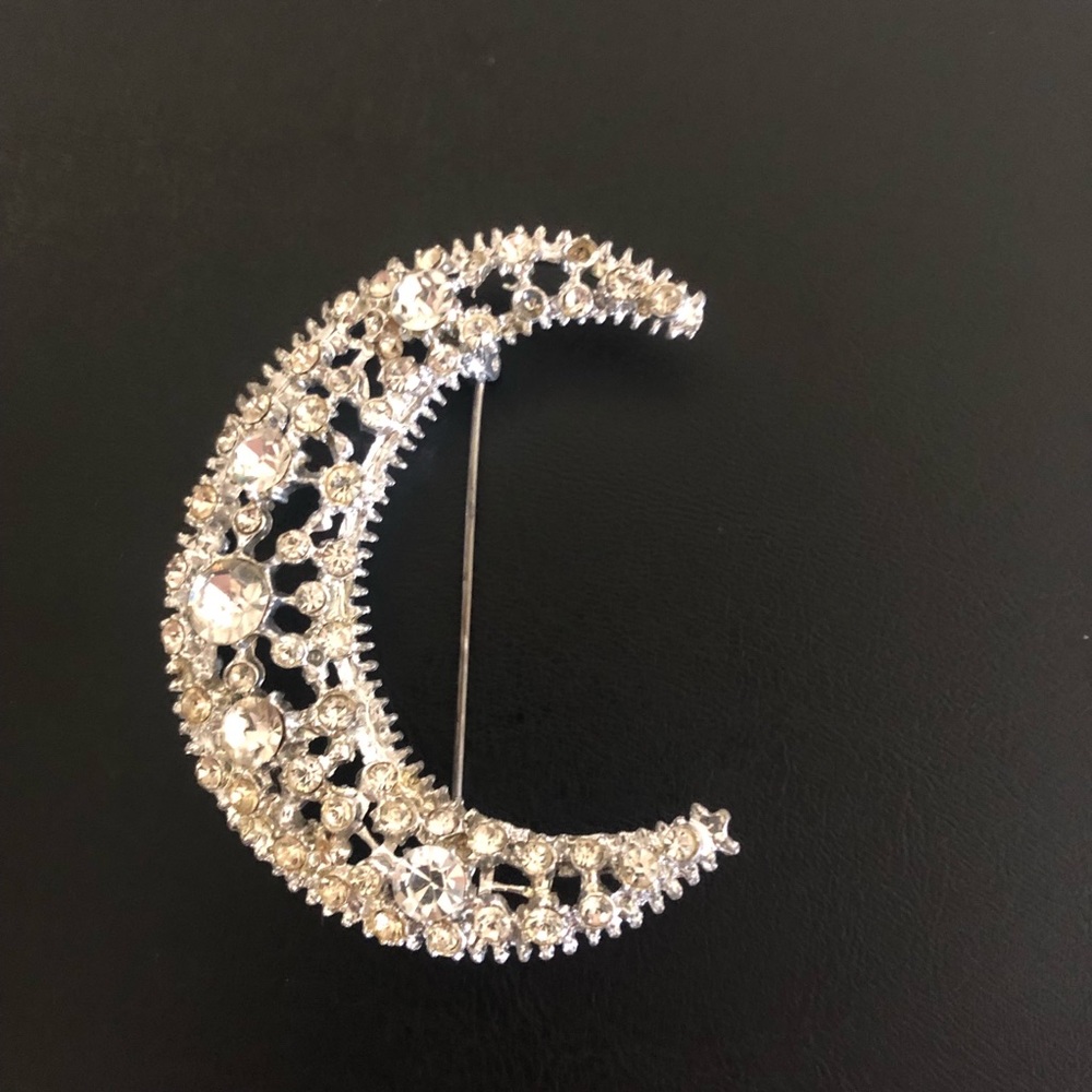 Crescent moon brooch